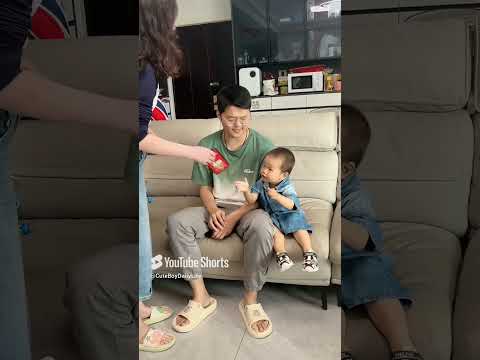 The baby plays with the phone when dad is not paying attention #baby #funny #cutebaby