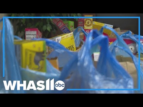 YouTube video thumbnail: Southern Indiana Church Fills Bags of Food for Families in Need