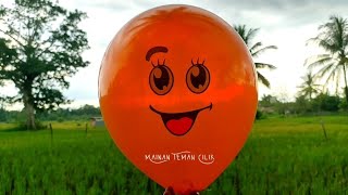 Woowww.... Meletuskan Balon Balon Di Pinggir Sawah  !!!