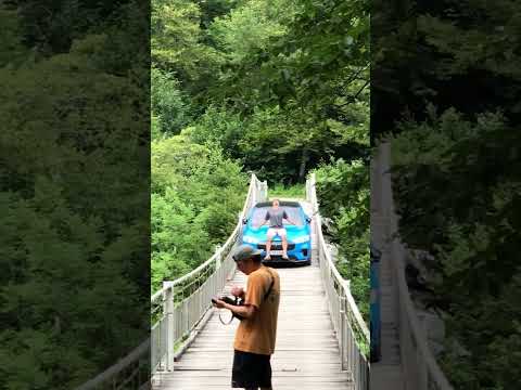 Driving on an old wooden bridge with a 2 tons E car for the perfect shoot