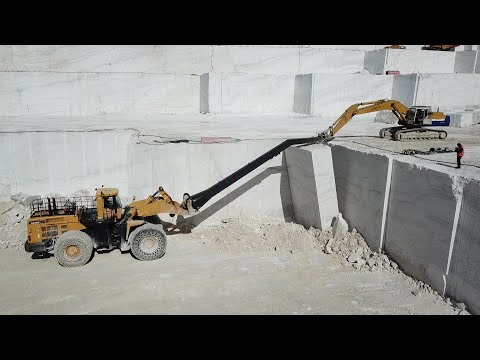 Komatsu Equipment WA900 - WA800 And Komatsu PC400 Excavator Working On Birros Marble Quarries