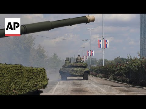 YouTube video thumbnail: Tanks Roll Into Belgrade in Preparation for Serbia's Military Parade