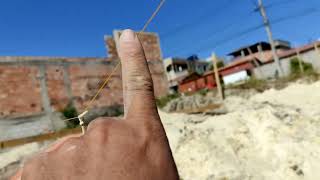 Como iniciar a primeira fiada de bloco em terreno declive construindo de forma economia