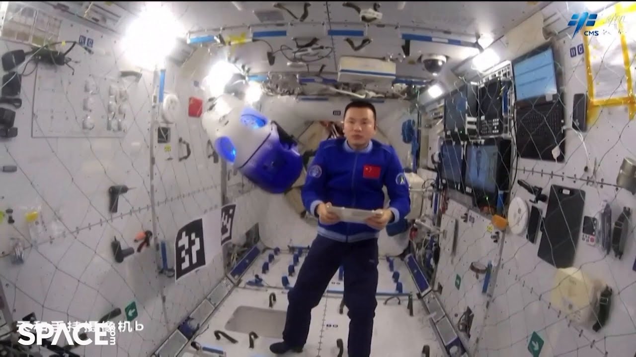 Chinese astronauts test ‘intelligent flight robot,’ check on fruit flies