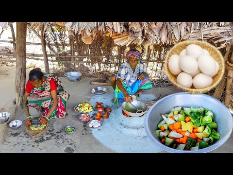 Mixed Vegetables cooking with Egg in village style by santali tribe couple for their lunch