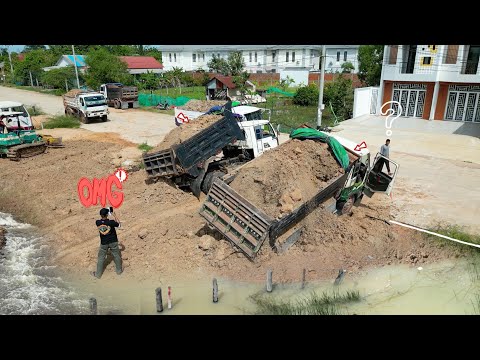 Amazing Dump Trucks Overloading Update PROJECT!! Landfill In The pond into trash filled swamp.
