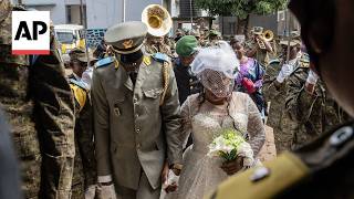 YouTube video thumbnail: No Kisses, no Hugs: How Ebola is Changing Weddings in Congo
