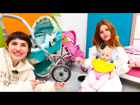 Oyuncak bebek Doll Annabelle ile kız oyunları! Annabelle için bebek arabası ve çantası!
