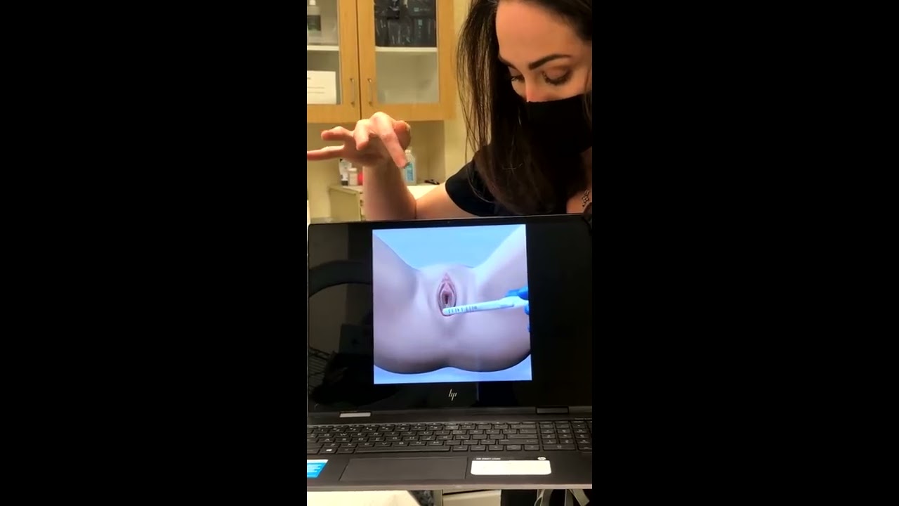 Demonstration of medical procedure on computer screen.