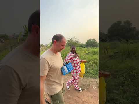 Giving out some refreshments to the kids in the neighborhood. They have the cutest smiles