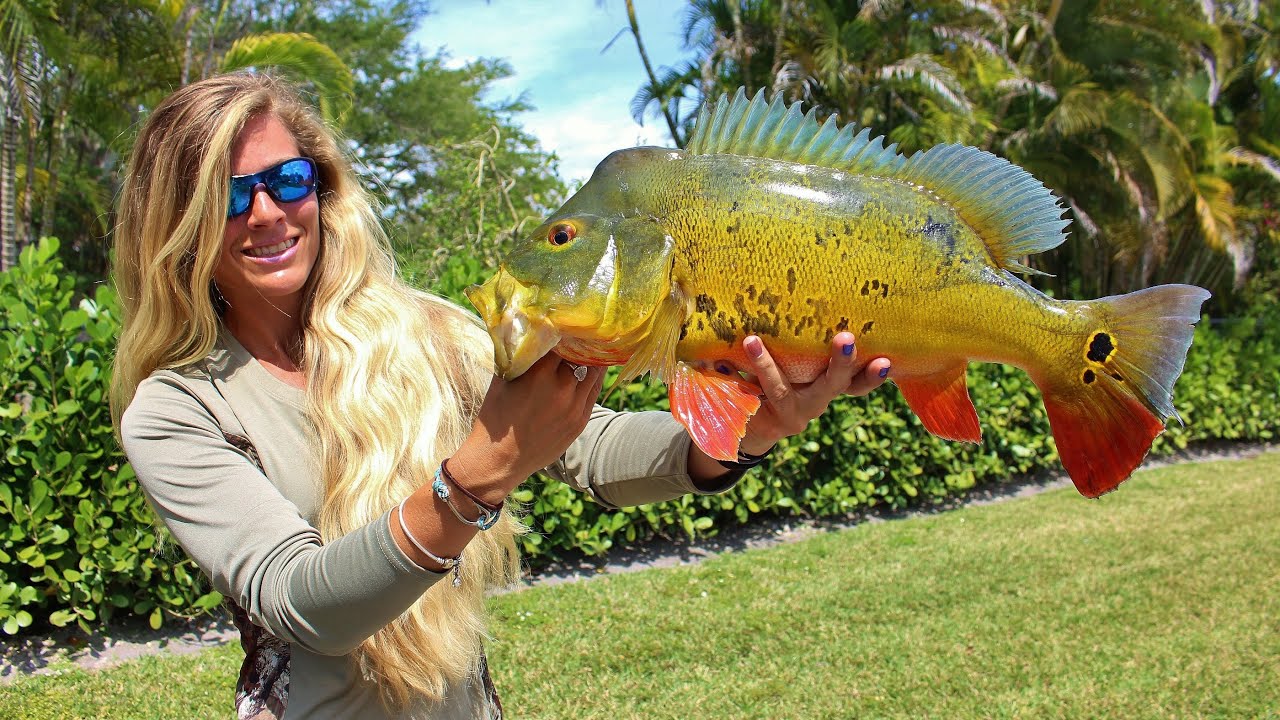 Girl Catching Big Florida Freshwater Peacock Bass