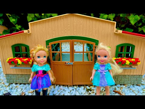 Elsa and Anna toddlers help at the stables with the horses