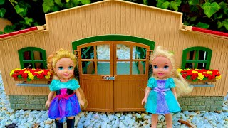 Elsa and Anna toddlers help at the stables with the horses