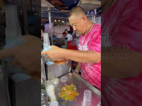 Amazing street food drink vendor working so fast