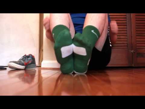 Sweaty Green Nike Elites and Nike shoes.