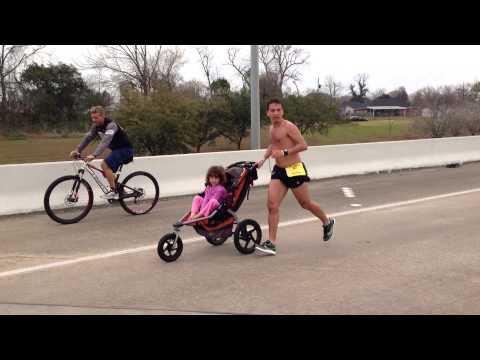 Man Diagnosed With Brain Cancer Wins The Gusher Marathon While Pushing Daughter In Stroller!