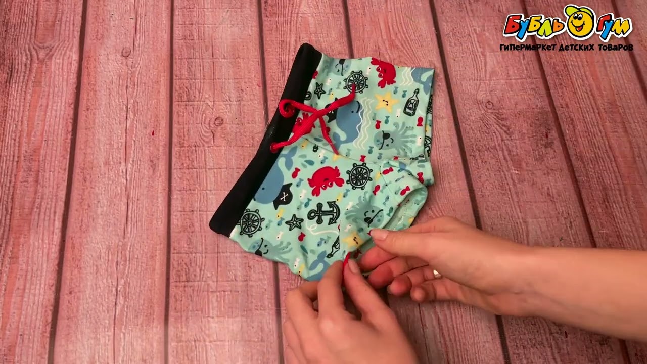 Плавки Lanson Kids с морским принтом светло-голубые с красными завязками  - видео