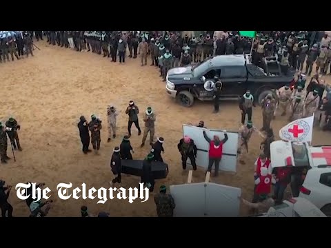 Hamas parades Israeli hostage's coffins on stage before Red Cross handover