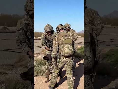 Watch troops fast rope out of a UH-60 Black Hawk with man's best friend