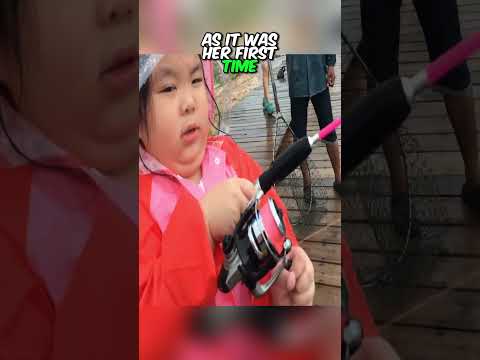 This little girl went for fishing for the first time.