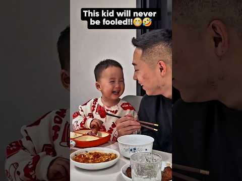 His eyes are alert!! His father tries to trick the little one