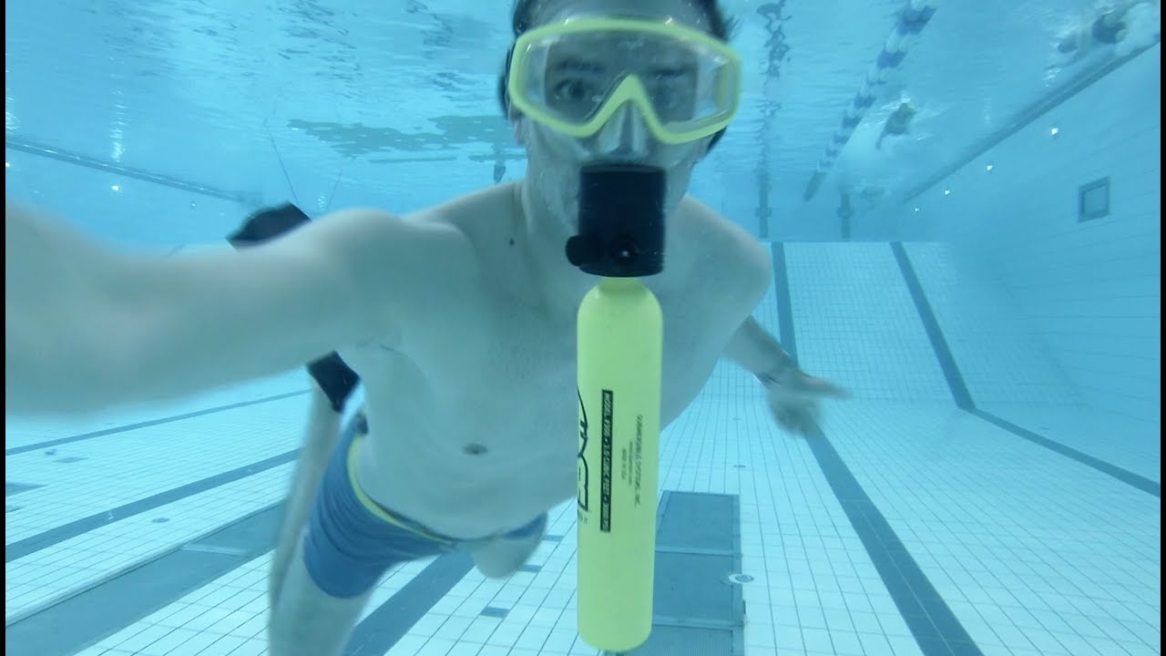 Testing A small scuba tank you can use under water for 3: 30 min - Christian Wedoy