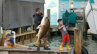 Kid Hooks his Huge Fish of a Lifetime Fishing Under a Dock!! Saltwater Fishing