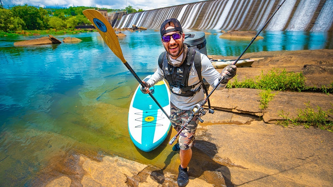 Paddle Board Fishing DANGEROUS Dam for BIG Fish! (unexpected giant)