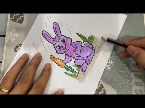 Color the picture of a rabbit holding a carrot