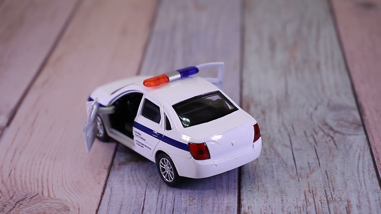 Машина КРУТЫЕ ТАЧКИ Полиция инерционная световые звуковые эффекты металлическая - видео