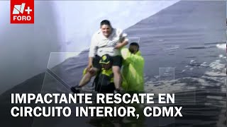 Rescatan a conductor atrapado en inundación en Circuito Interior, CDMX - Las Noticias
