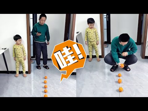 爸爸沉迷玩手机，用橙子测试他的反应，果然还得是儿子机智啊！#Cute baby#Cute#呆萌小米宝#聪明宝宝#萌娃