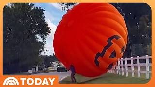 YouTube video thumbnail: Giant Inflatable Pumpkin Rolls Down North Carolina Road