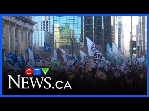 YouTube video thumbnail: Unions Rally Against Quebec Reform Bill