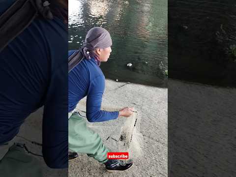 respect to this guy how easily and perfectly he throws this cast net and catches a fish