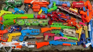 Box of Toy Guns. AK47 Rifles Toys, Metallic Tec 9 Gun, Exploding Weapons, Sharp Karambin Knives