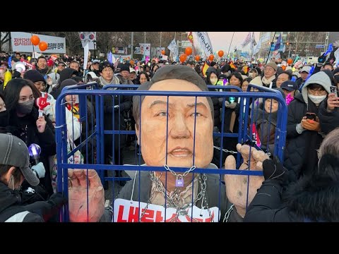 Protesters celebrate as President Yoon agrees to 'step aside' after impeachment vote | AFP