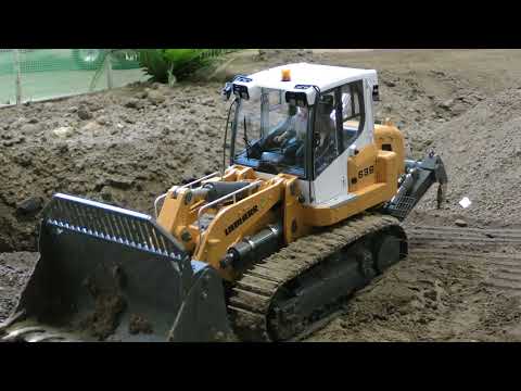 Liebherr 636 pushing soil at the landfill