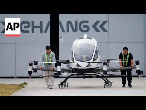 YouTube video thumbnail: Could China's Flying Taxi Take-off hit a bit of Turbulence?