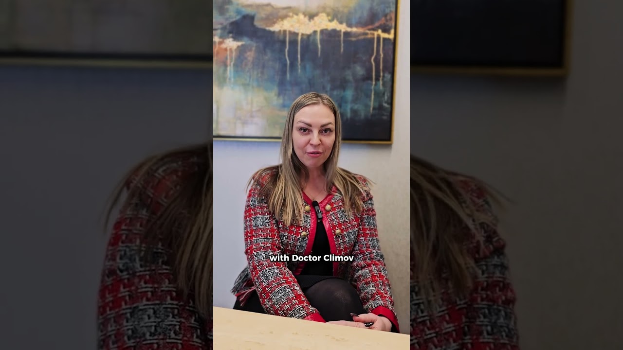 Doctor Climonv speaking in a professional setting.