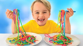 Kinder lernen Pasta kochen