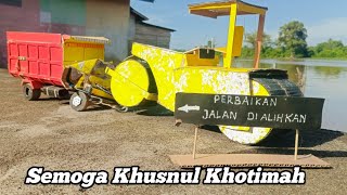 Dump Truk Tabrak Alat berat Perbaikan Jalan