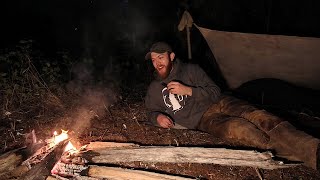 Backcountry Bedroll Camp Next To Forest Creek