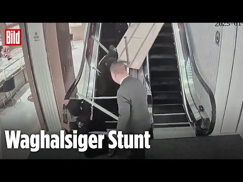 Tisch-Transport auf Rolltreppe geht schief