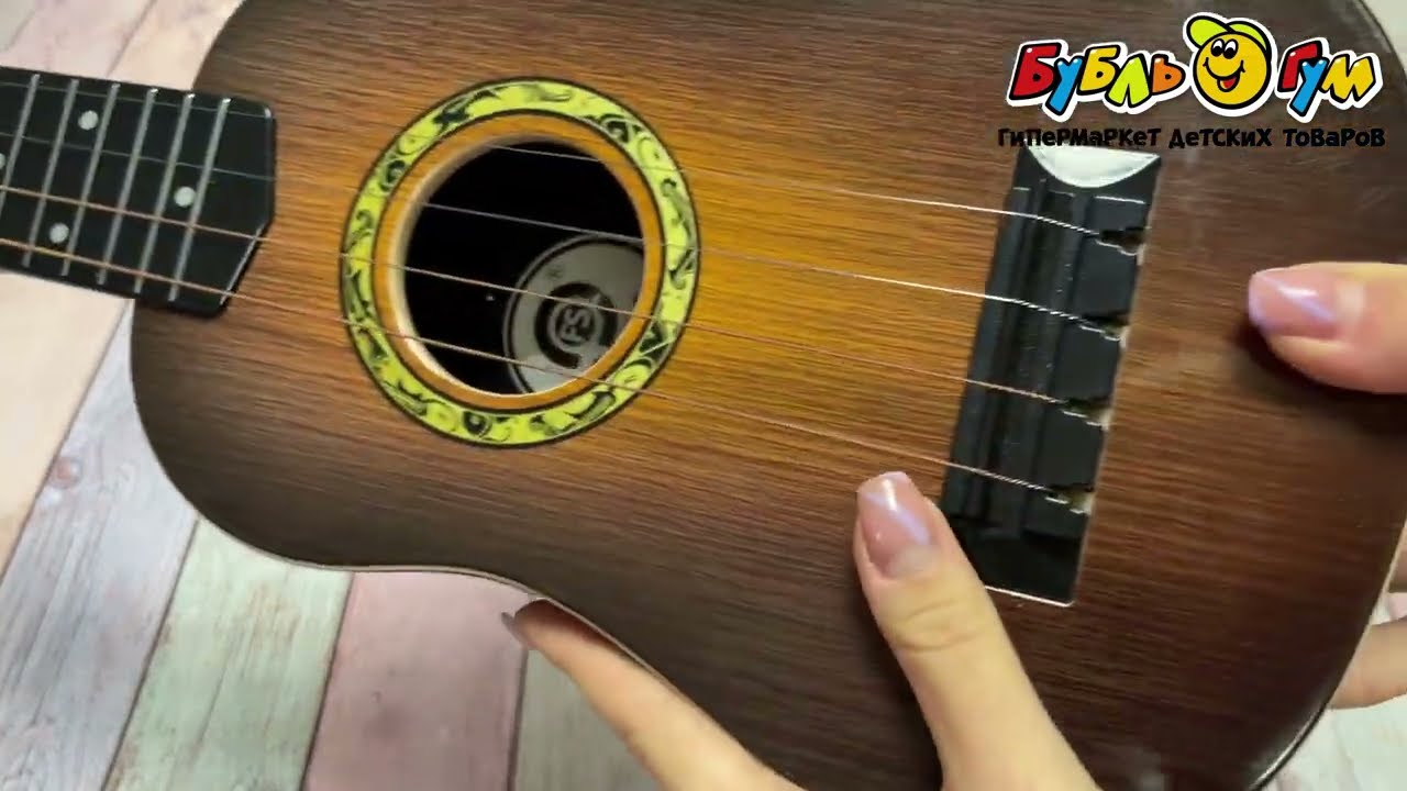 Игрушка музыкальная укулеле - видео