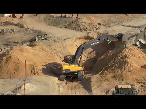 YouTube video thumbnail: Machinery Digs for Bodies of Israeli Hostages in Khan Younis