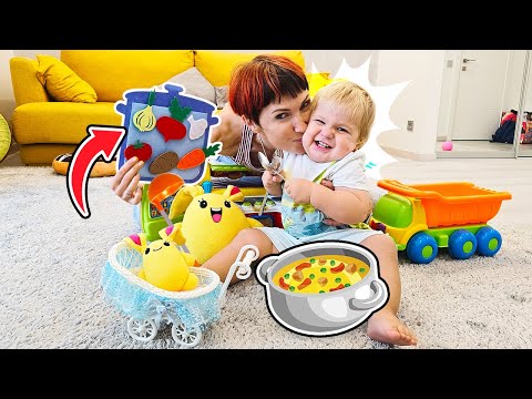 Maria and Lucky pretend to play cooking toy food for toy baby bunny. Family videos for kids.