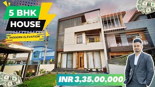 Inside a Modern Elevation House With Bar Area, Movie Area, Lush Green Area And 5 Car Parking