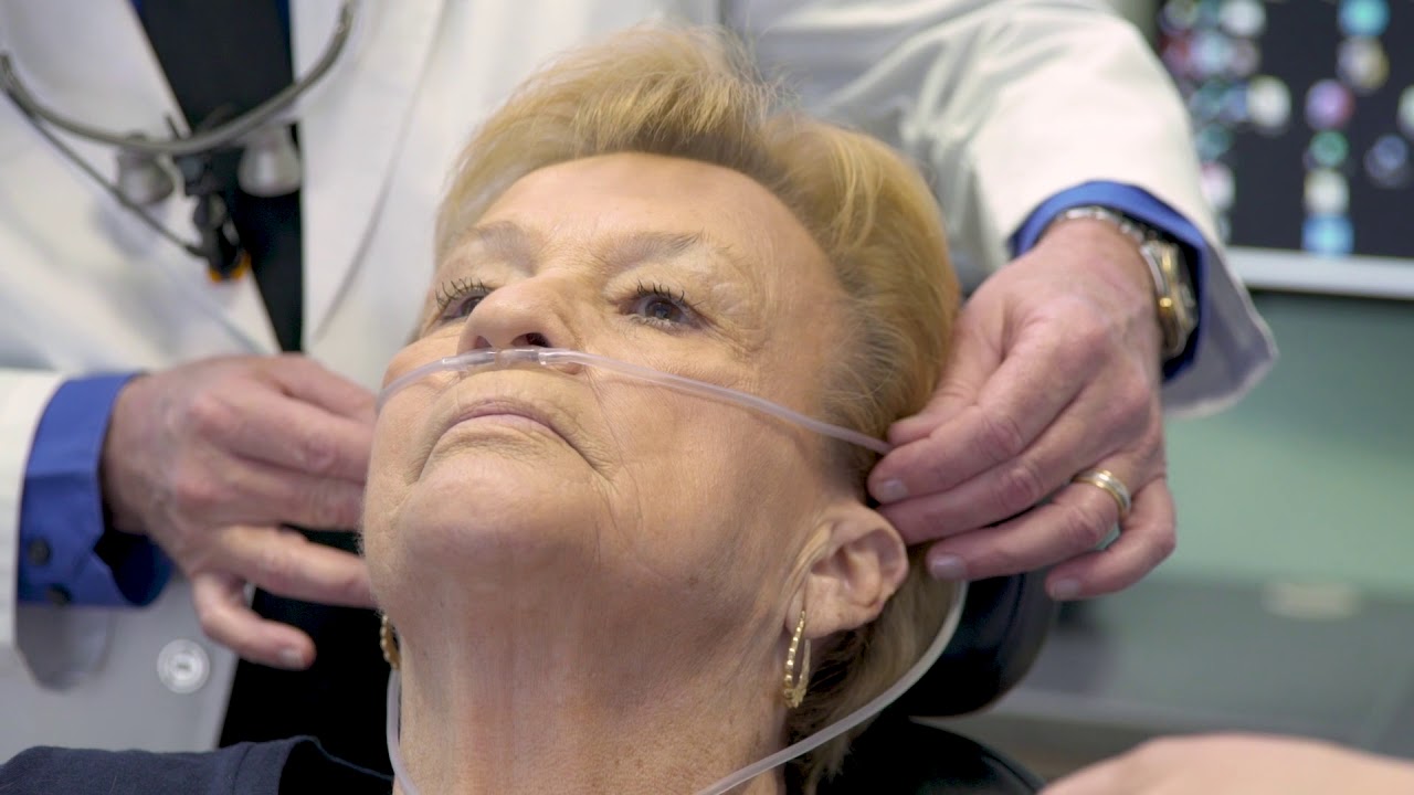 Patient receiving care with nasal cannula.