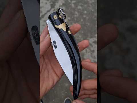 Making pocket knife with engraved Buffalo logo